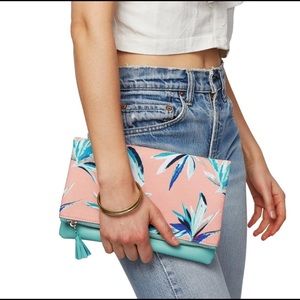 Rachel Pally reversible clutch